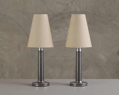 PAIR OF MACHINE AGE ALUMINUM LAMPS